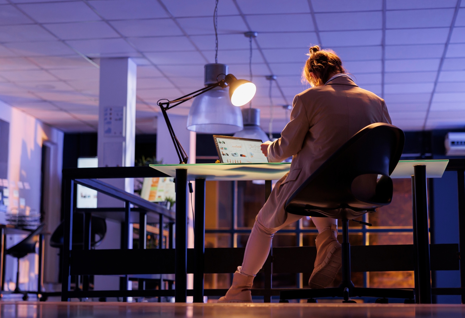 employee working until late at night, concept of work addiction