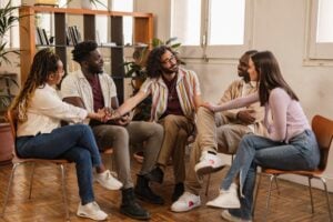diverse group of people during group therapy