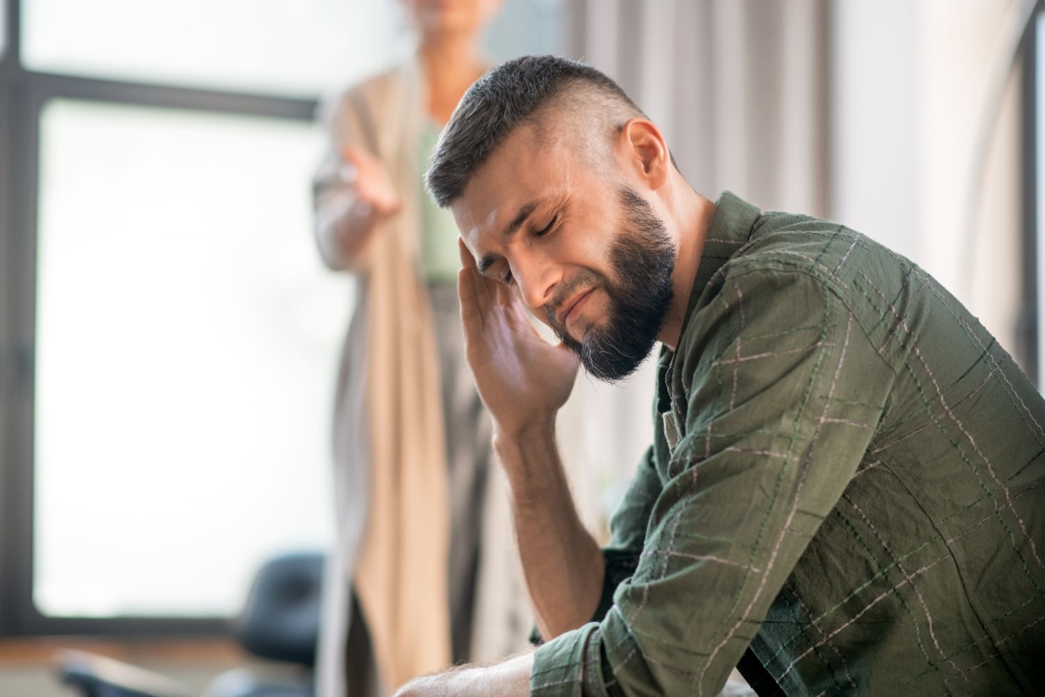 man having trouble focusing, showing signs of depression, anxiety, mood problems